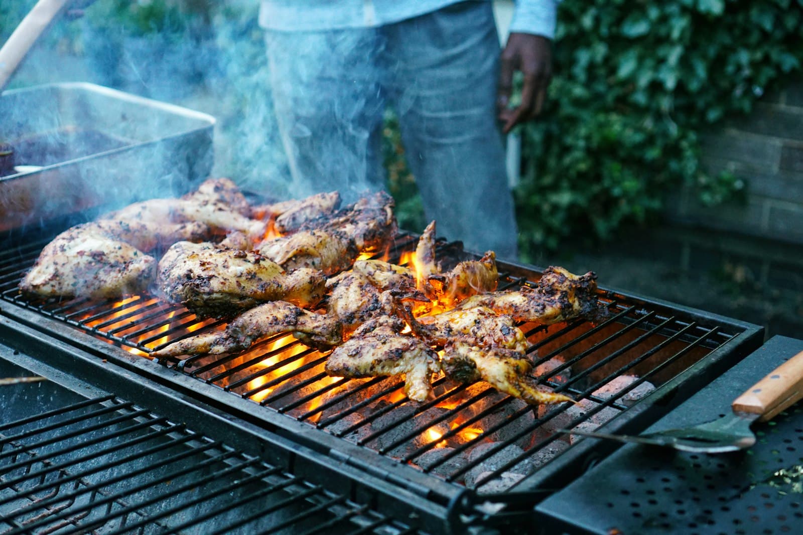 Meat grilling over an open outdoor fire